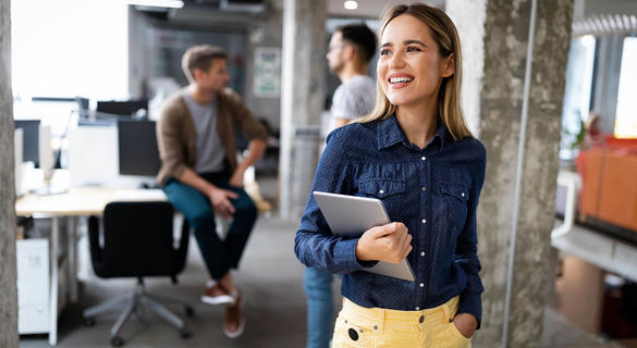 Happy woman in office