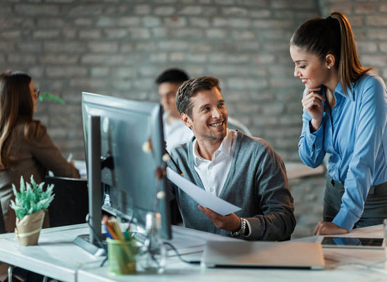 Working contact center team discussing reports