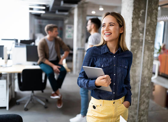 Happy woman working in the office