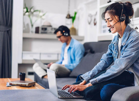 Man and woman working from home as remote workers