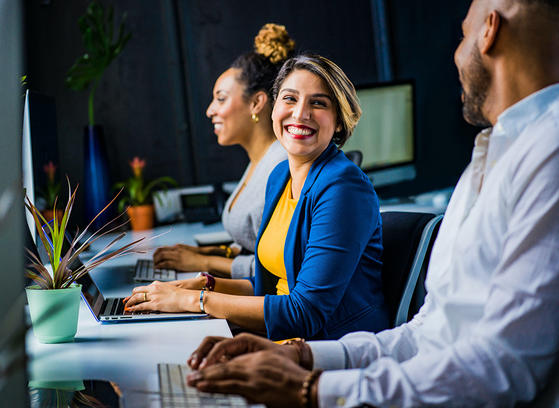 Happy woman working in the office