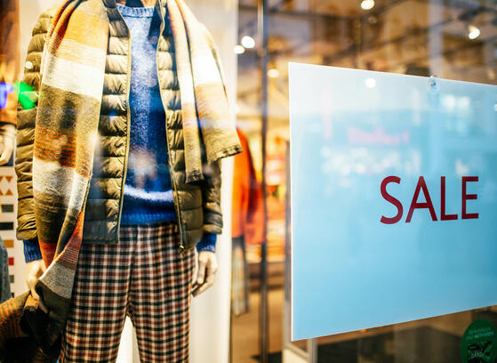 Retail window featuring a big Black Friday sale promotion