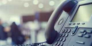 Close-up of office desk phone