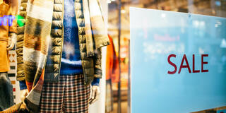 Retail window featuring a big Black Friday sale promotion