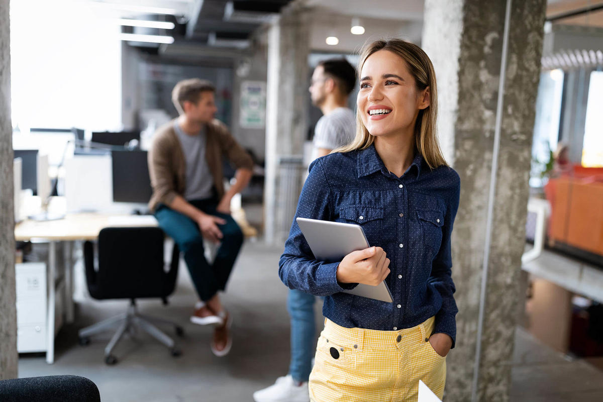 Happy woman working in the office