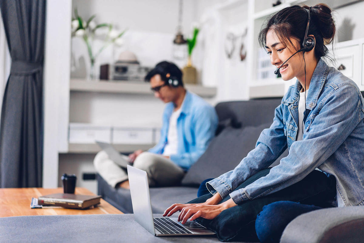Man and woman working from home as remote workers