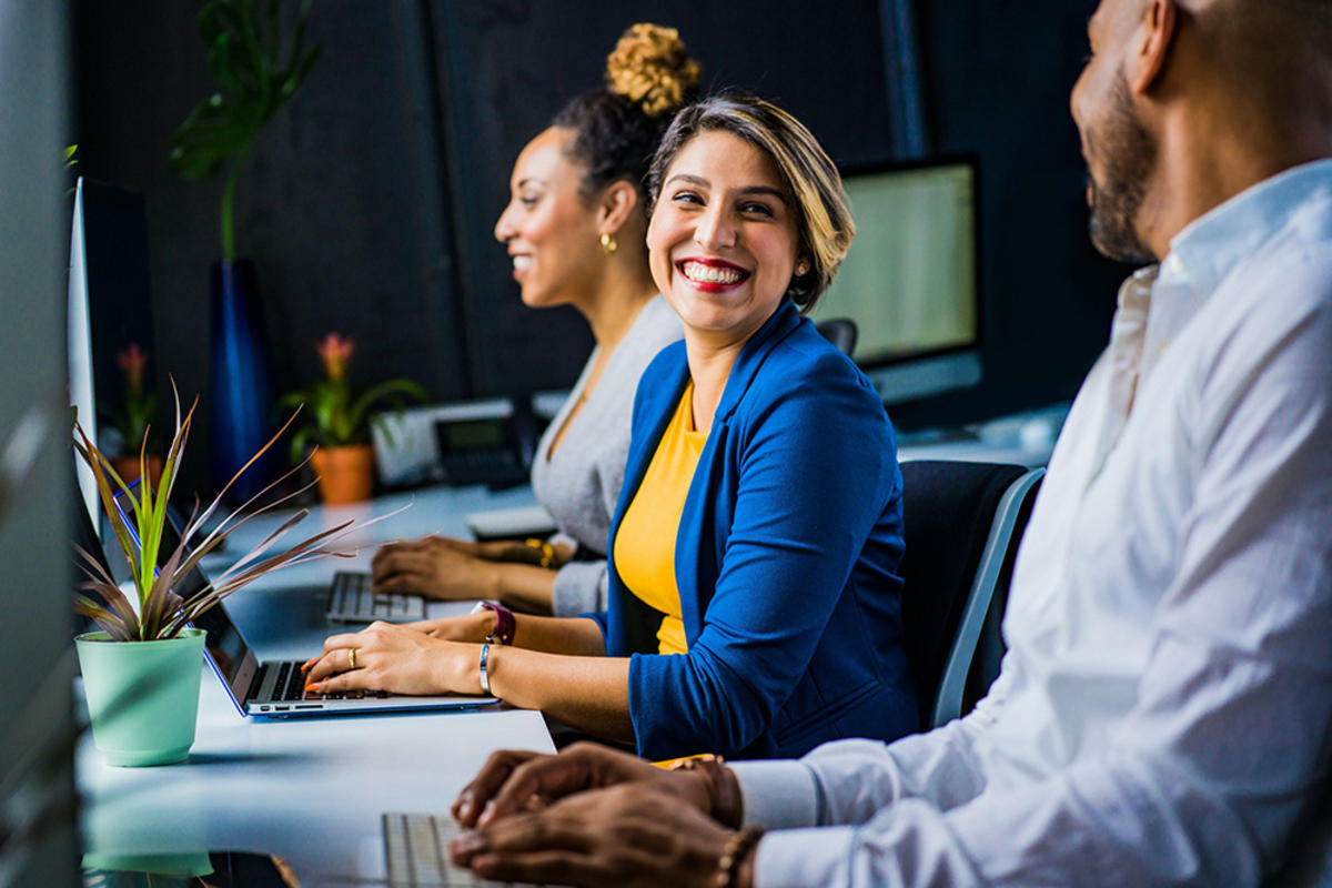 Happy woman working in the office