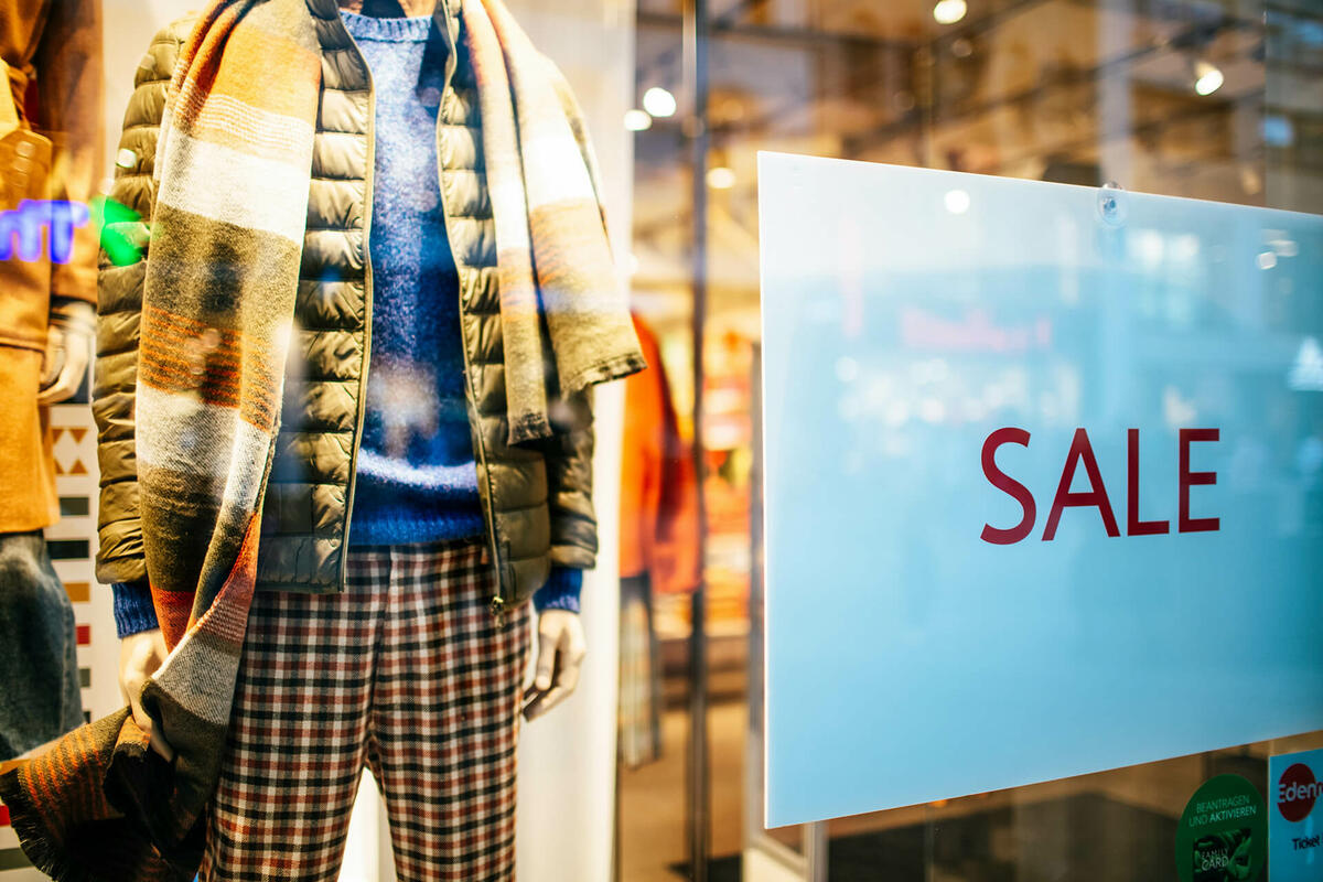 Retail window featuring a big Black Friday sale promotion