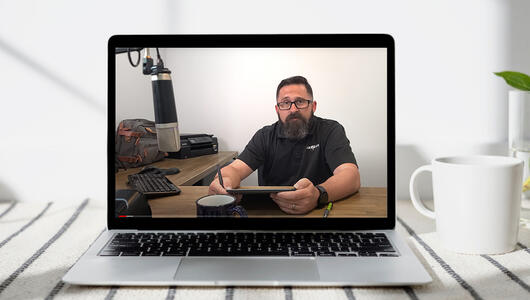 Hammer podcast, focusing on industry experts insights and foresight into the future, playing on laptop