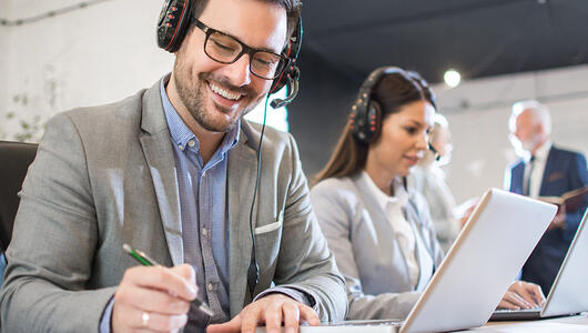 Man and woman working at a call center