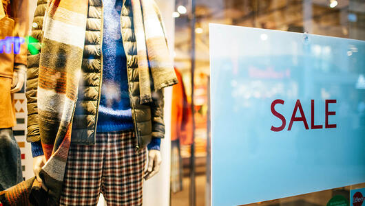 Retail window featuring a big Black Friday sale promotion
