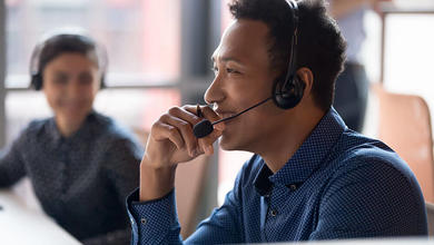 Asian man working at helpdesk