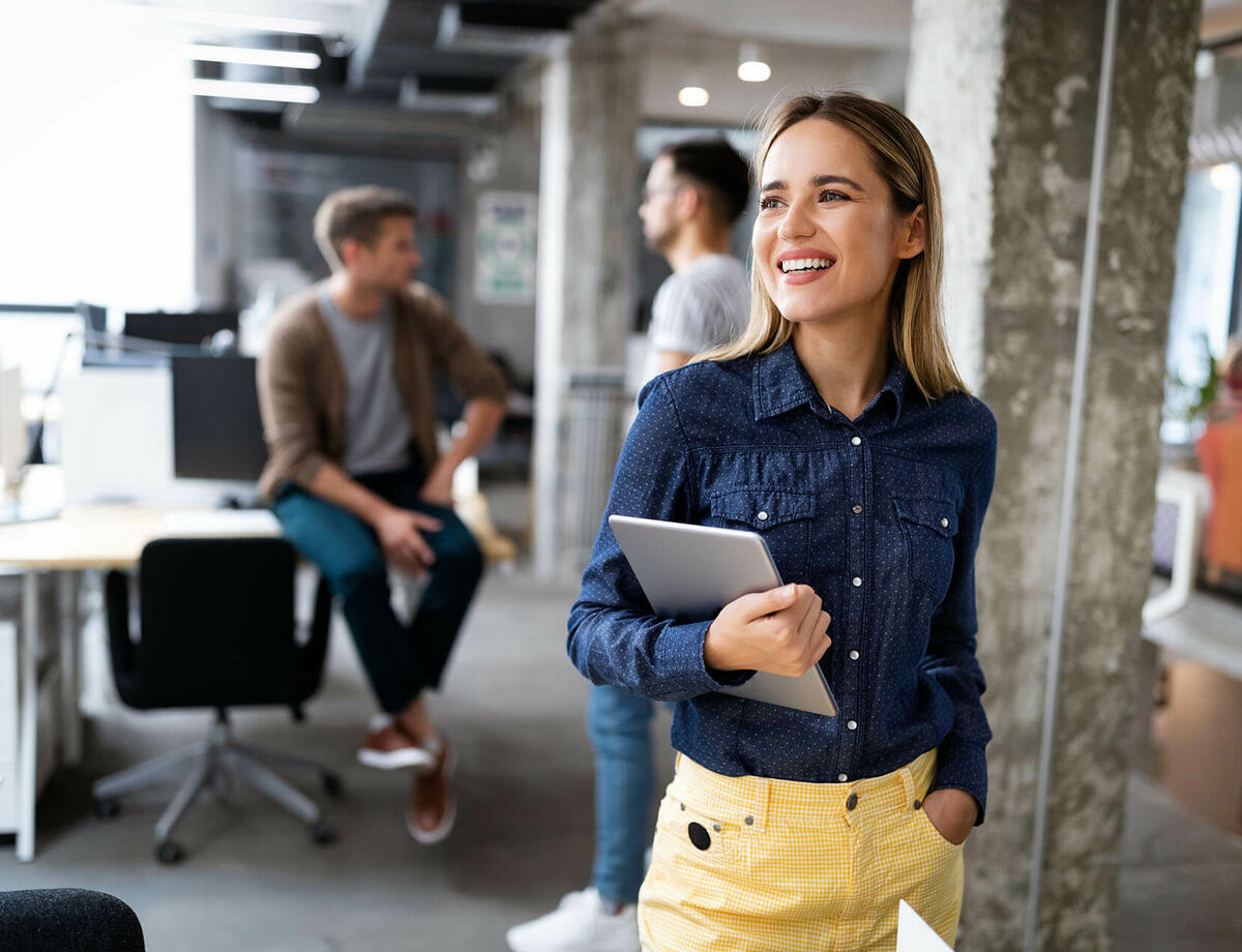 Happy woman in office